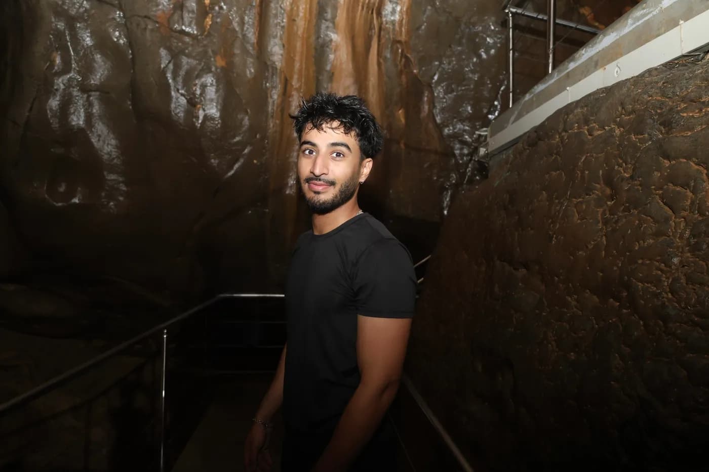 Ali exploring a cave