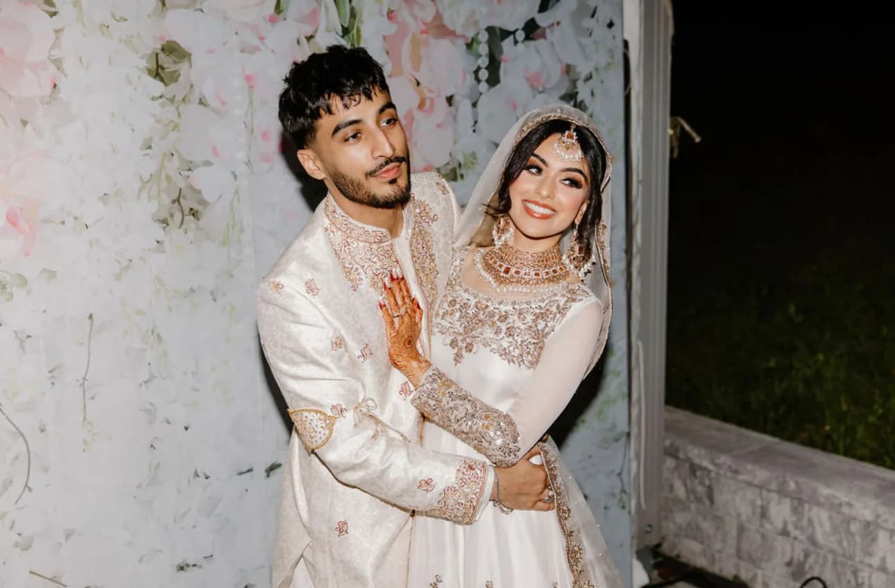 Ali and his partner celebrating in formal attire